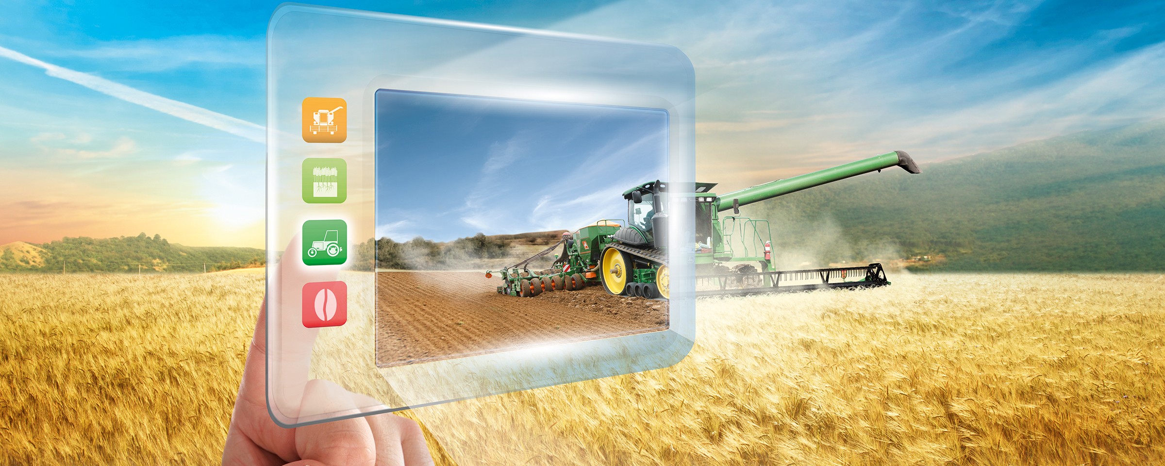 v popředí obilného pole ruka pracuje s tabletem